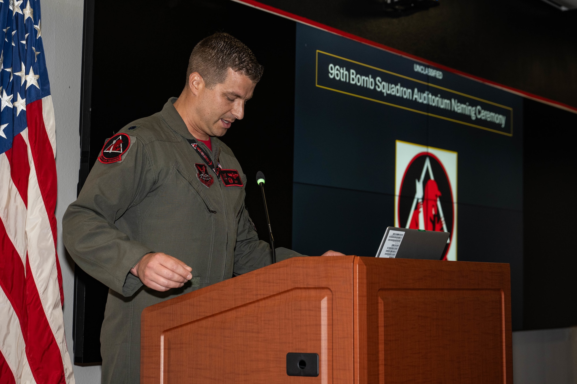 U.S. Air Force Lt. Col. Matthew Dougherty, 96th Bomb Squadron commander, shares remarks