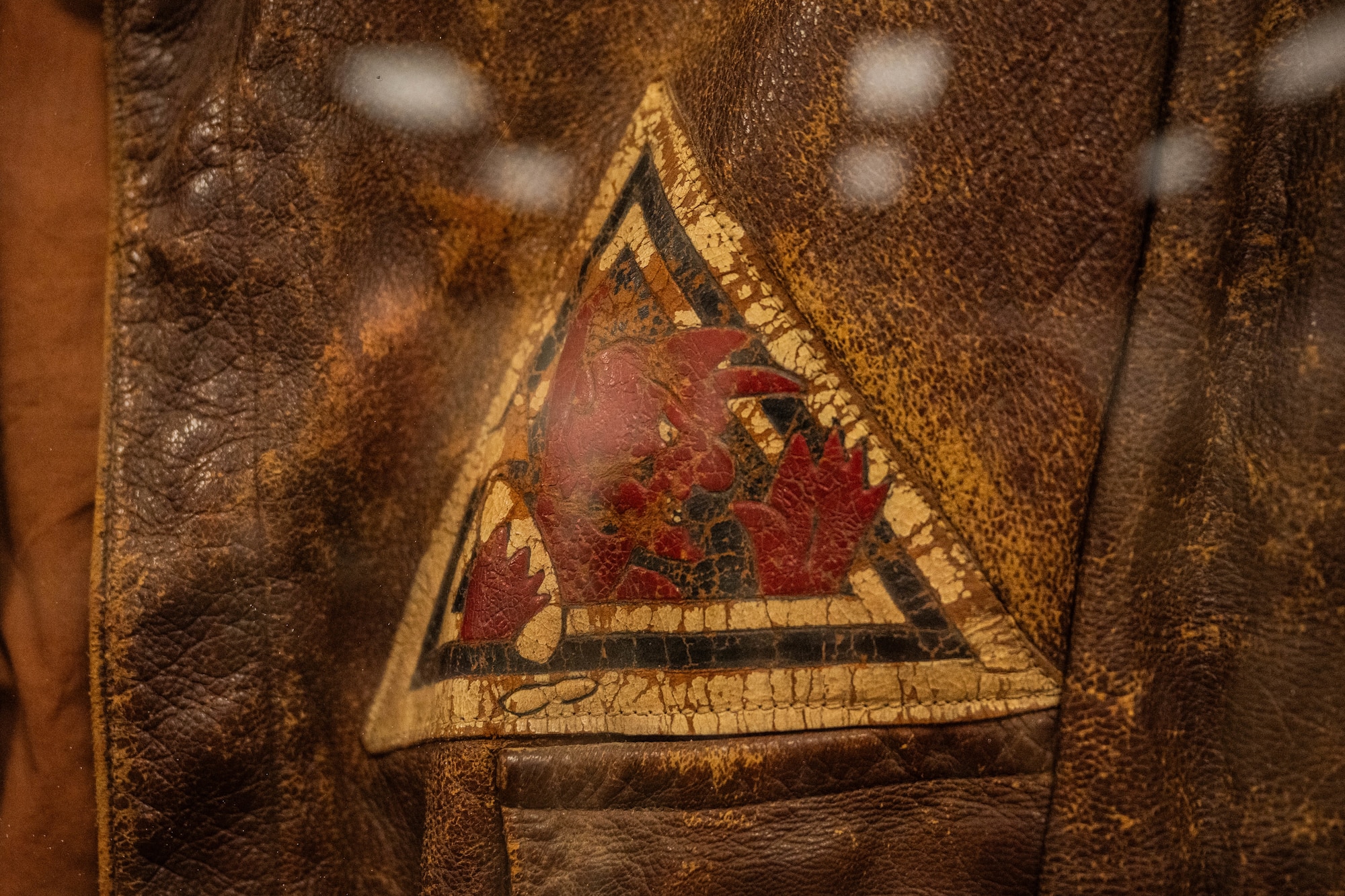 A 96th Bomb Squadron jacket is displayed