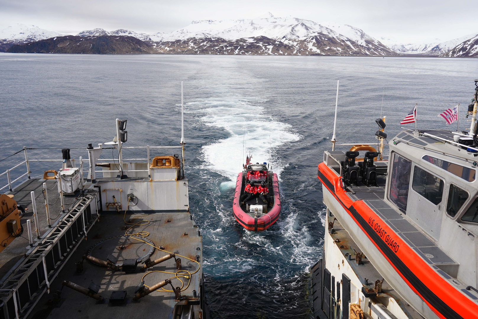 The U.S. Coast Guard Cutter Munro’s  (WMSL 755) 26-foot over-the-horizon cutter boat returns to the fantail notch after conducting a boarding of a commercial fishing vessel in Dutch Harbor, Alaska May 2, 2025. Munro conducted a total of 32 boardings in the Bering Sea to preserve fisheries resources and ensure each vessel’s safety, survival, and communications gear complied with federal regulations. (U.S. Coast Guard photo by Lt. j.g. Samika Lewis)