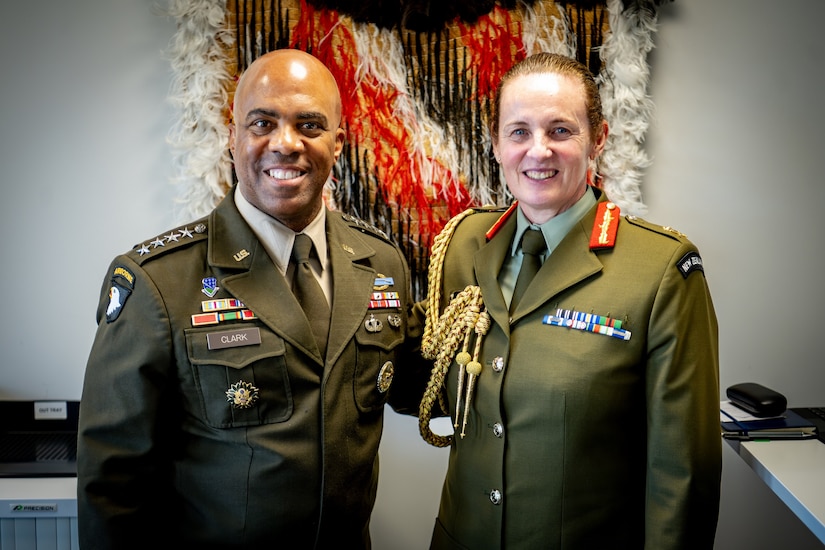 General Ronald P. Clark, commanding general U.S. Army Pacific receiving a brief from Colonel Lisa Kelliher, Commander of Army Training Group in Waiouru.