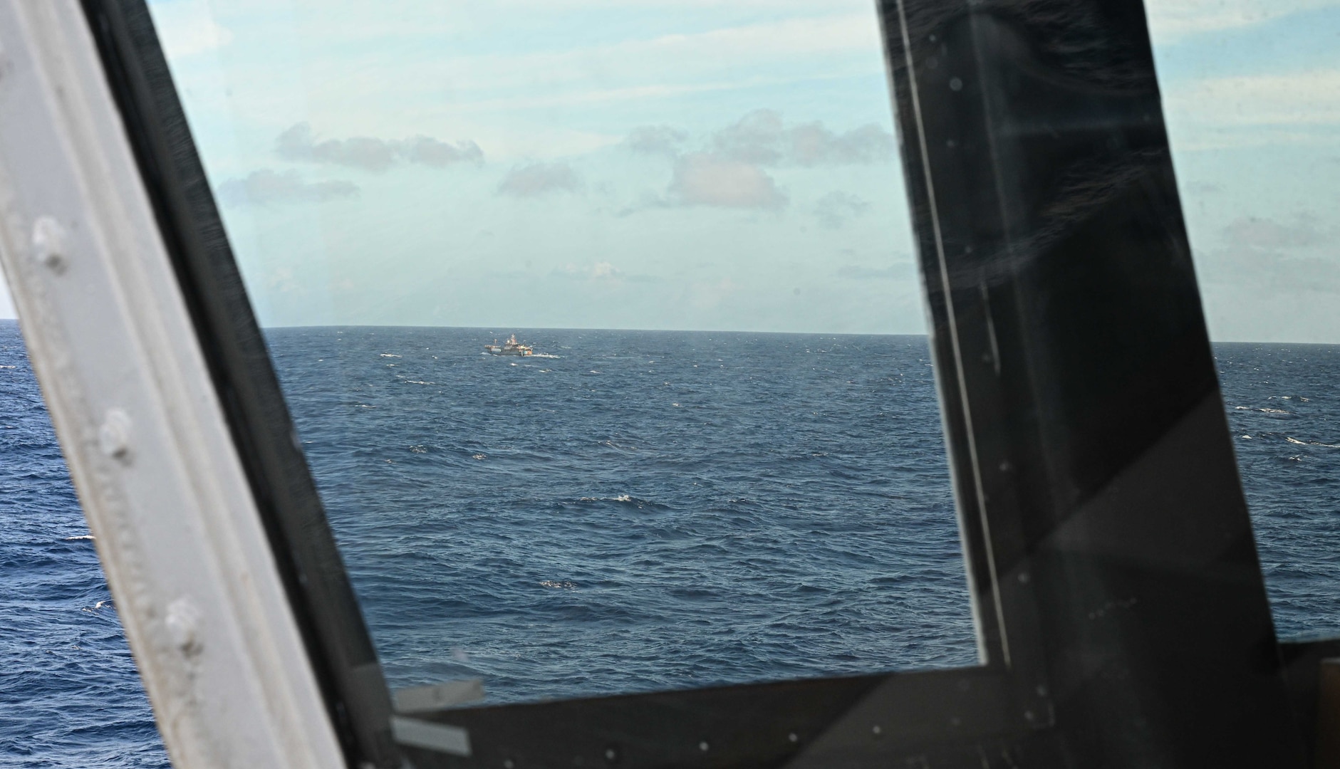 A fishing vessel operates in the Republic of the Marshall Islands (RMI) exclusive economic zone, July 10, 2025. The U.S. Coast Guard and the RMI have long cooperated to enhance maritime security and sovereignty in the Pacific with a focus on bilateral maritime law enforcement operations that help combat maritime trafficking and safeguard fisheries for both countries. (U.S. Coast Guard photo by Petty Officer 2nd Class Kate Kilroy)