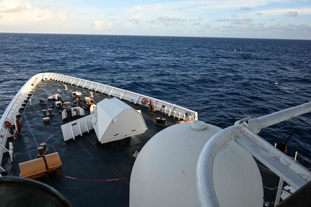 A fishing vessel operates off the starboard bow of the Legend-class U.S. Coast Guard Cutter Stratton (WMSL 752), within the Republic of the Marshall Islands (RMI) exclusive economic zone, July 10, 2025. The U.S. Coast Guard and the RMI have long cooperated to enhance maritime security and sovereignty in the Pacific with a focus on bilateral maritime law enforcement operations that help combat maritime trafficking and safeguard fisheries for both countries. (U.S. Coast Guard photo by Petty Officer 2nd Class Kate Kilroy)