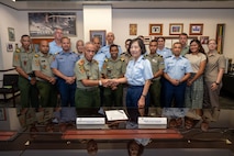 U.S. Air Force Brig. Gen. Sarah Russ, USINDOPACOM J5 Mobilization Assistant and Brig. Gen. Jose da Costa Soares, Chief of Staff of the Timor-Leste Defence Force shake hands during a Bilateral Defense Discussion at USINDOPACOM headquarters on Camp H.M. Smith in Honolulu, July 21-22, 2025.