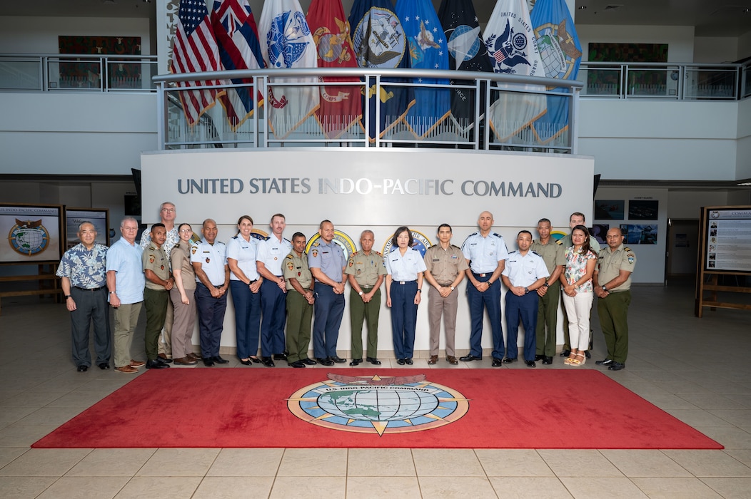 U.S. Air Force Brig. Gen. Sarah Russ, USINDOPACOM J5 Mobilization Assistant joins Brig. Gen. Jose da Costa Soares, Chief of Staff of the Timor-Leste Defence Force and their delegations for a Bilateral Defense Discussion group photo at USINDOPACOM headquarters on Camp H.M. Smith in Honolulu, July 21-22, 2025.