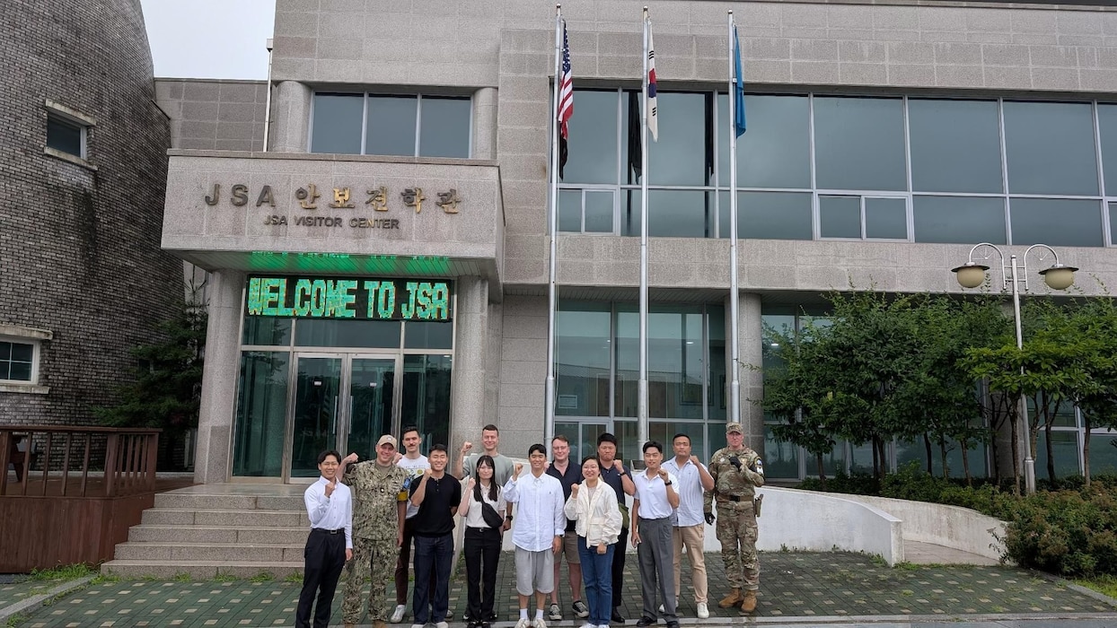 Junior officers assigned to Commander, U.S. Naval Forces Korea (CNFK), Republic of Korea Navy (ROKN), and Japan Maritime Self Defense Force (JMSDF) tour the Joint Security Area of the DMZ during a three-day Trilateral Junior Officer Exchange across South Korea, July 18, 2025.