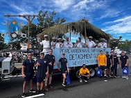 Members of Pearl Harbor Naval Shipyard Detachment Guam participate in the 81st Liberation Day parade.
