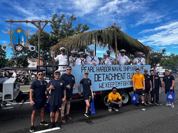 Members of Pearl Harbor Naval Shipyard Detachment Guam participate in the 81st Liberation Day parade.