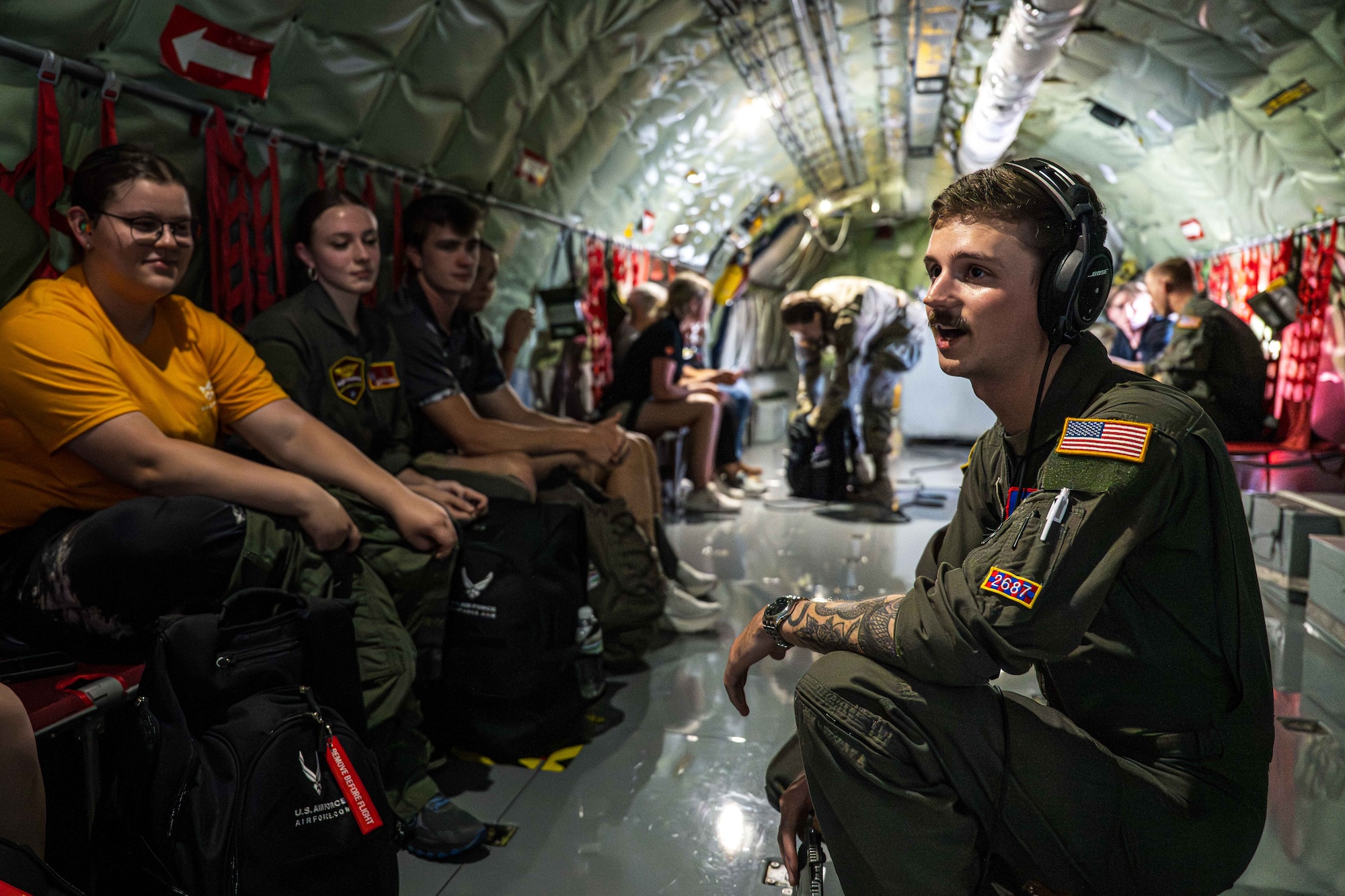U.S. Air Force Staff Sgt. Nick Belmonte, 54th Air Refueling Squadron instructor boom operator, briefs students before takeoff at Altus Air Force Base, Oklahoma