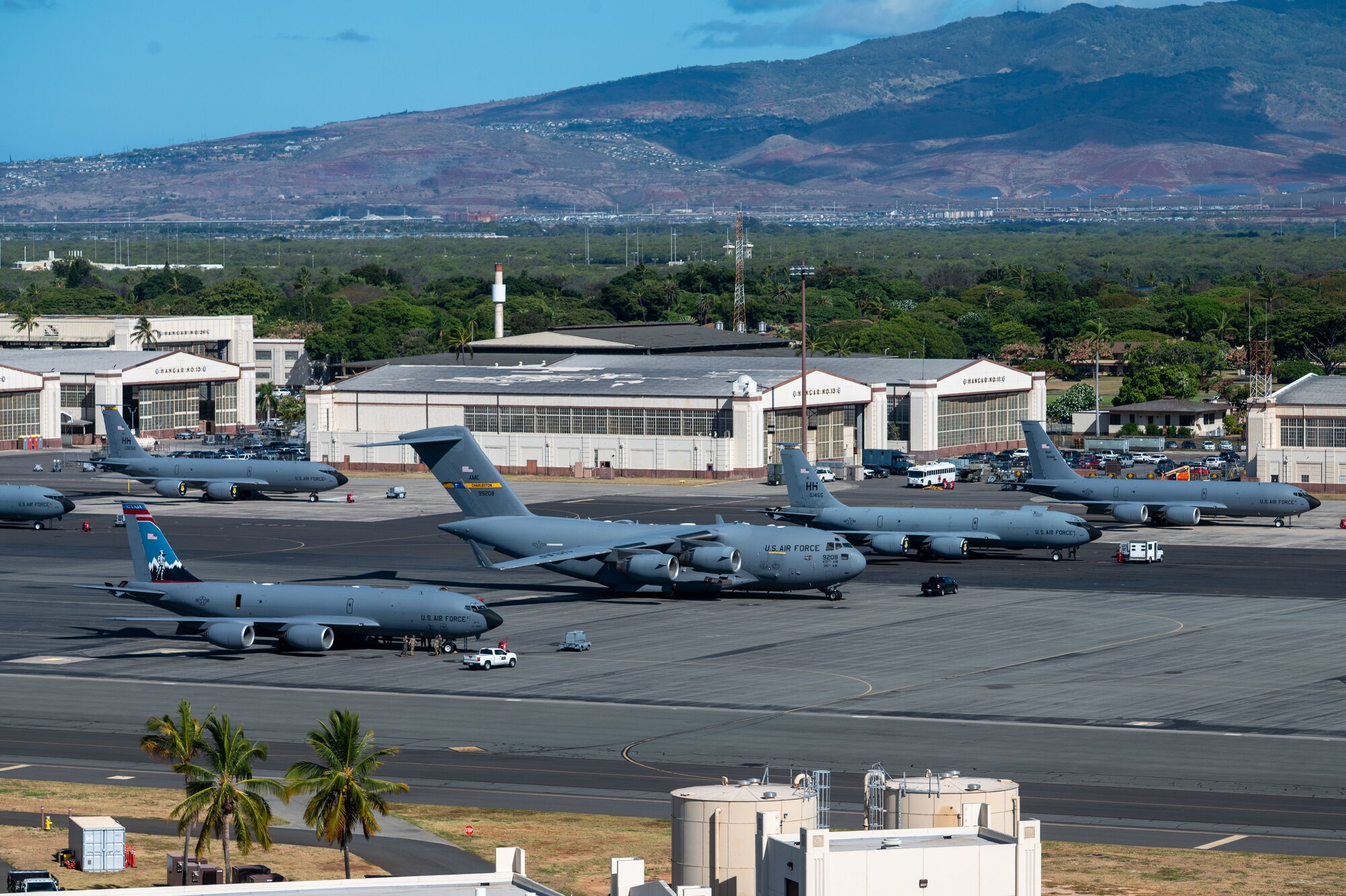Overview photo of a flightline with military aircraft parked.