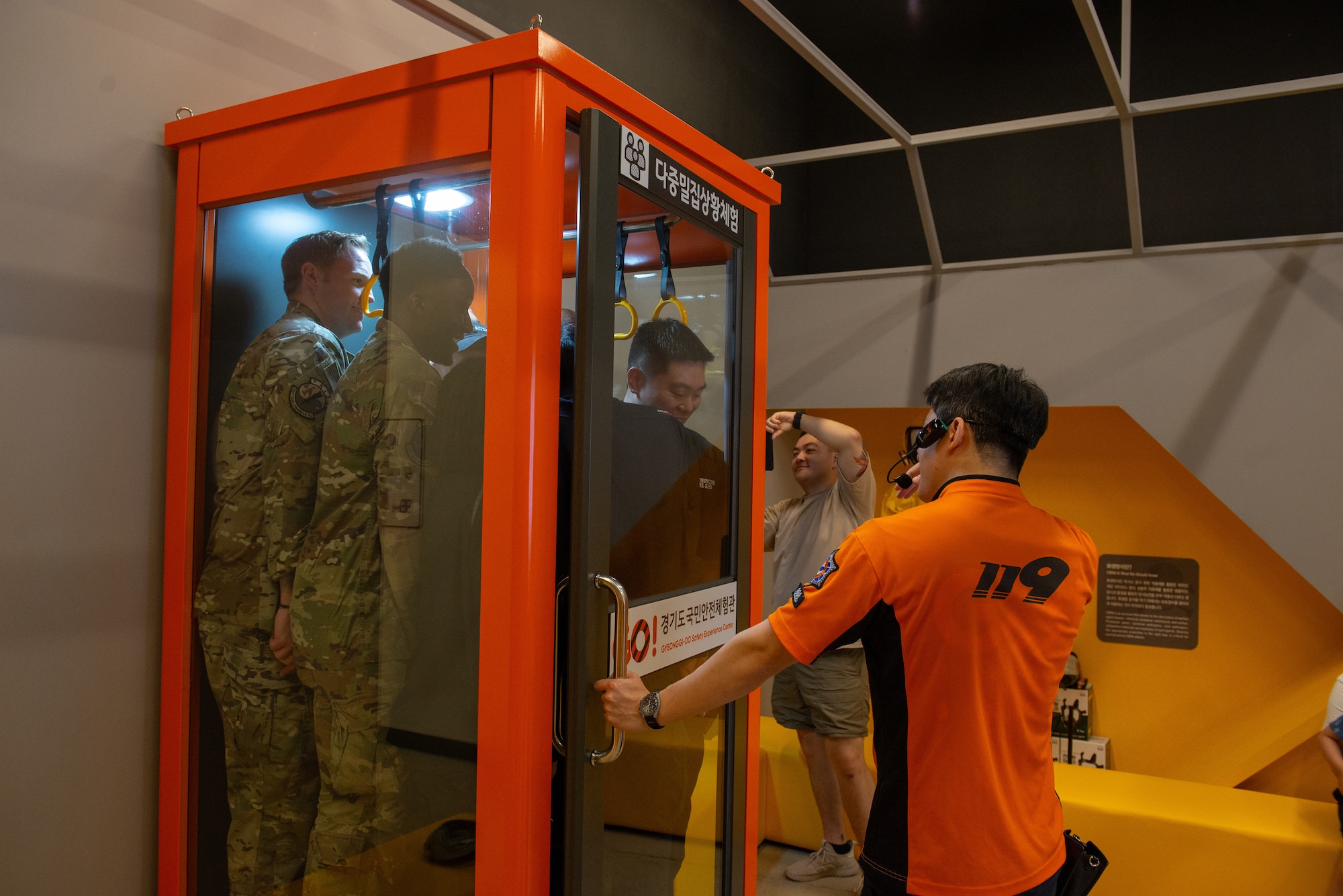 Airmen experience crowd crush conditions during a safety center tour.