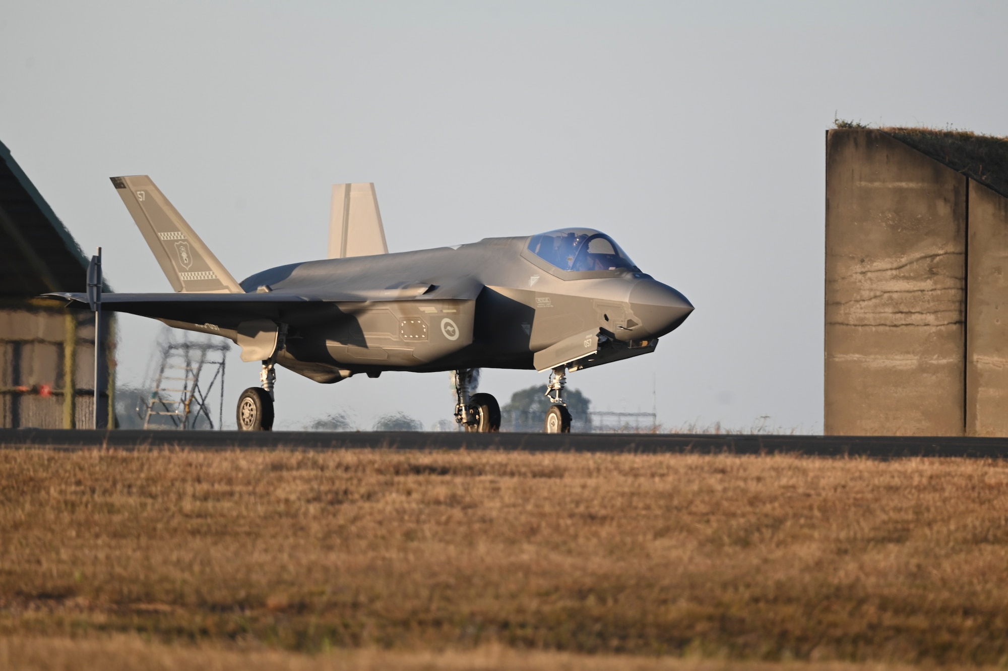 A Royal Australian Air Force F-35A Lightning II taxis on the flightline during Talisman Sabre 25 in Northern Territory, Australia, July 16, 2025. The F-35A was piloted by U.S. Air Force Maj. Colby “Burn” Kluesner, 388th Fighter Wing F-35A Lightning II evaluator pilot, as part of an international interfly between the RAAF, USAF, U.S. Marine Corps, and Royal Air Force. Talisman Sabre is the largest bilateral military exercise between Australia and the United States, that advances a safe and secure Indo-Pacific by strengthening relationships and interoperability among key allies and partners, while enhancing our collective capabilities to respond to a wide array of potential security concerns. (U.S. Air Force photo by Airman 1st Class Joseph Maye)