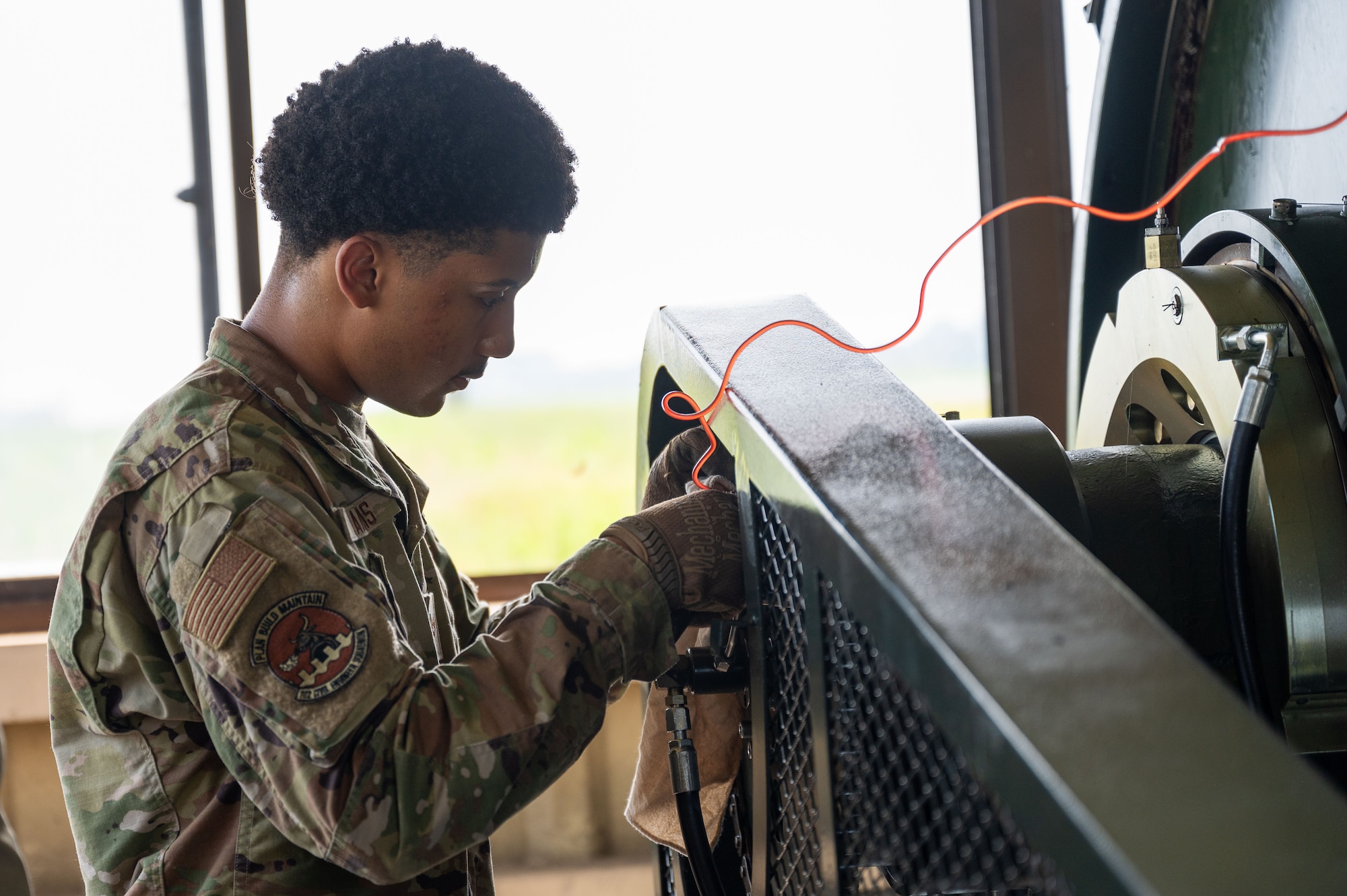 Airman works on a BAK-12.