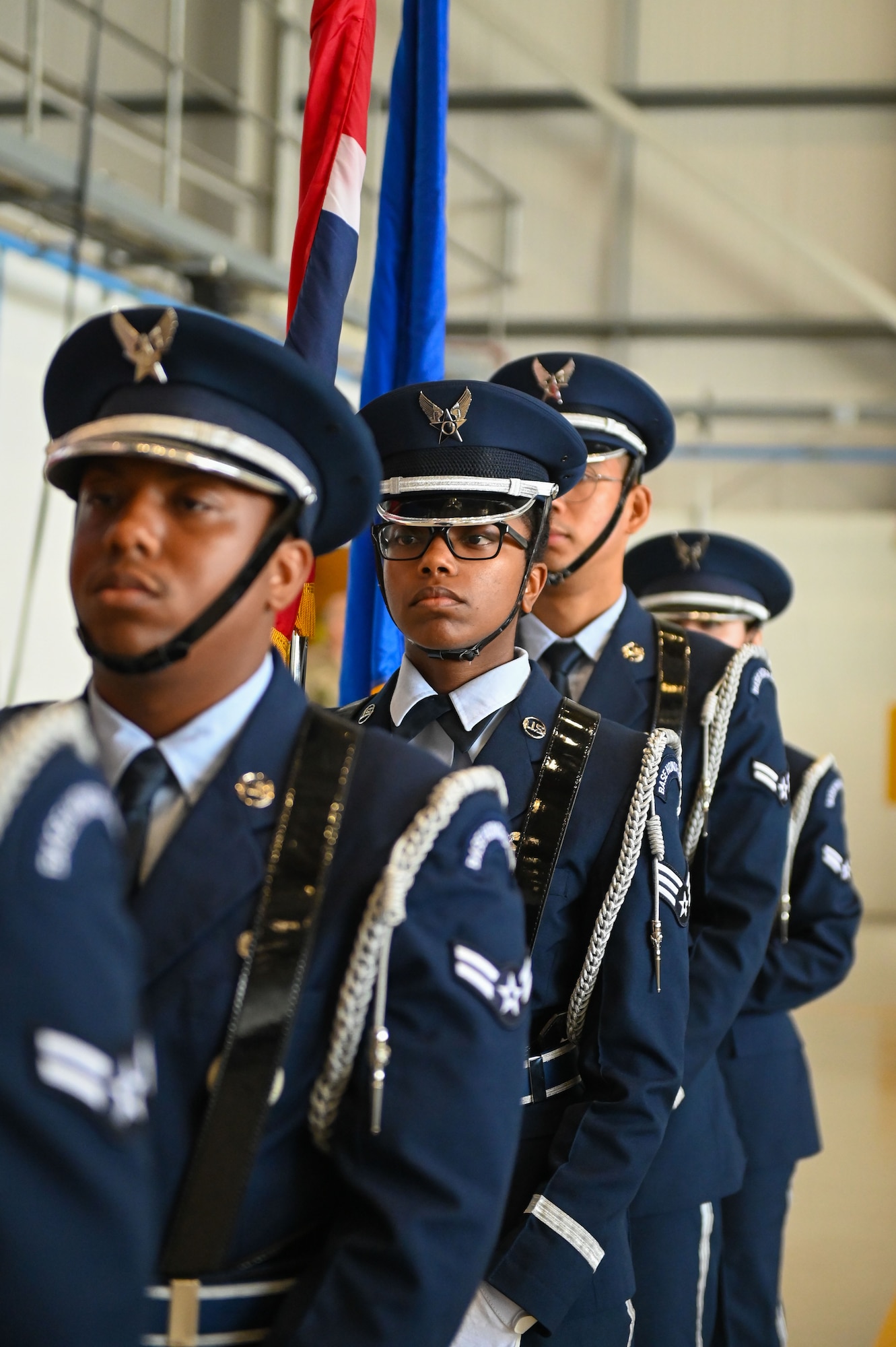 U.S. Air Force honor guard assigned to the 100th Air Refueling Wing presents the colors at the 100th Air Refueling Wing change of command ceremony at RAF Mildenhall, England, July 22, 2025.