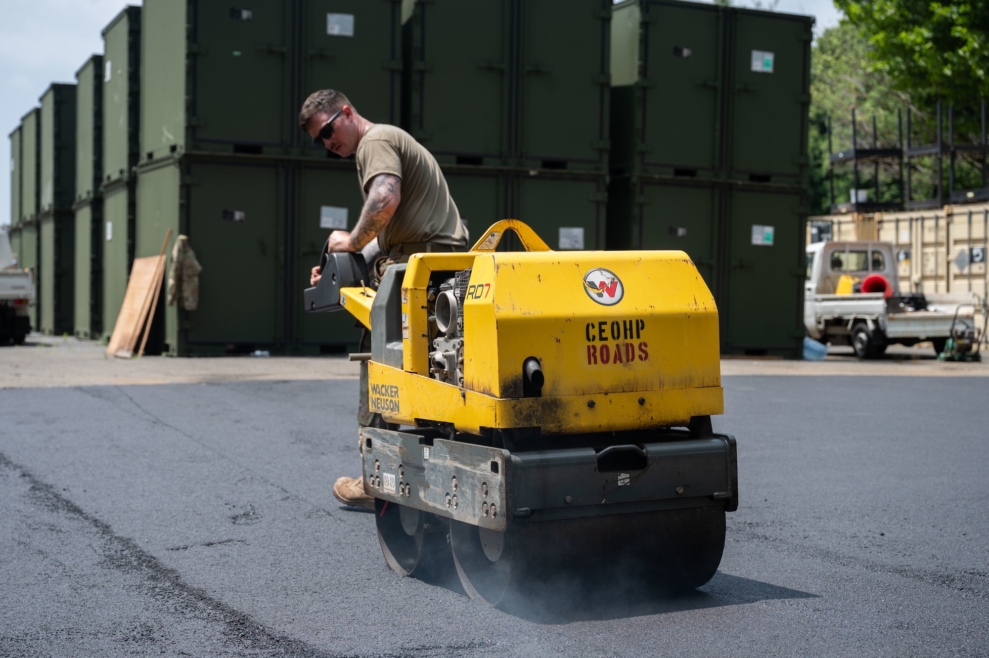Airman pulls a roller.