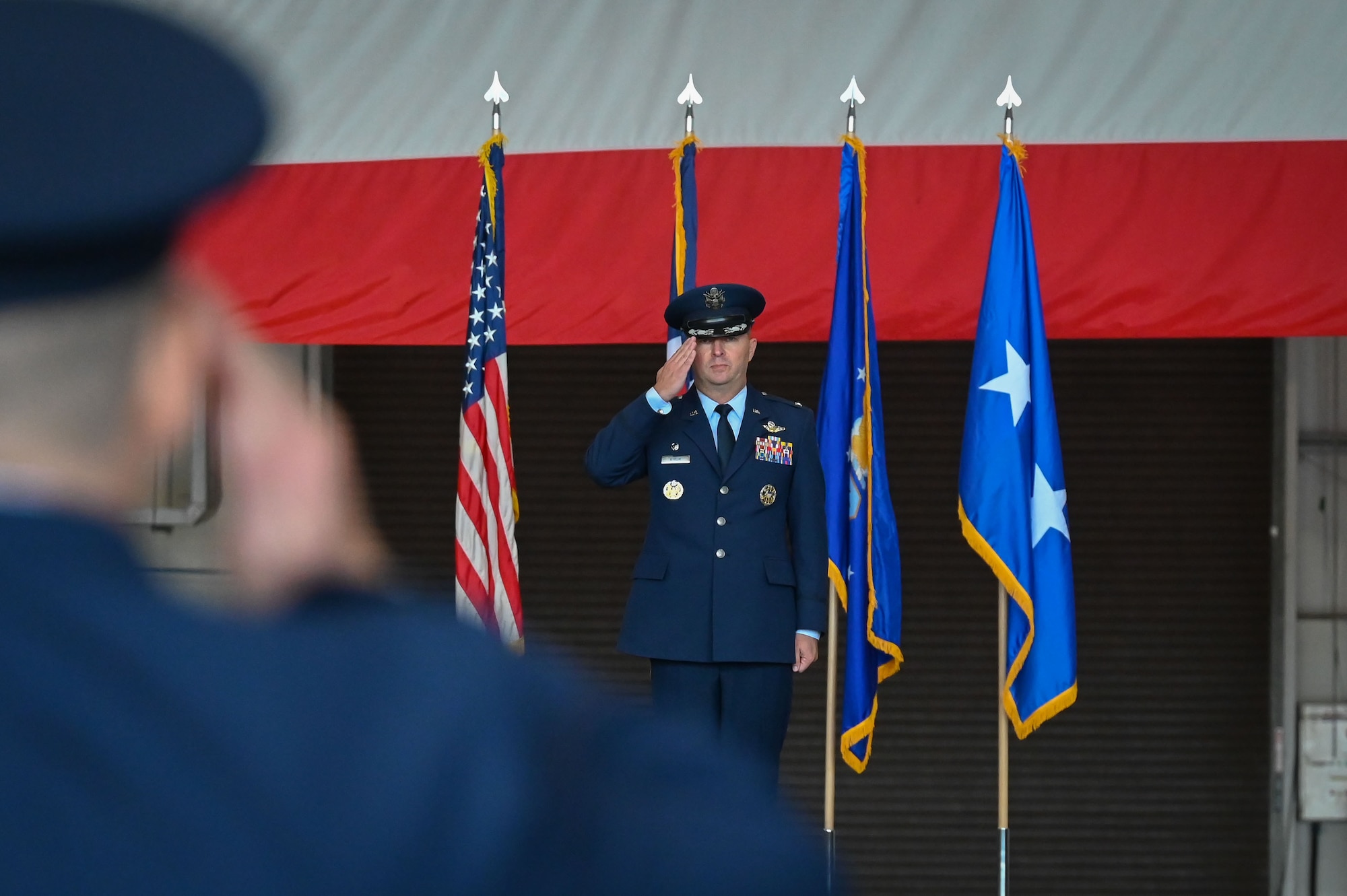 U.S. Air Force Col. Steven Byrum, 100th Air Refueling Wing incoming commander, receives his first salute as commander during the 100th ARW change of command ceremony at Royal Air Force Mildenhall, England, July 22, 2025.