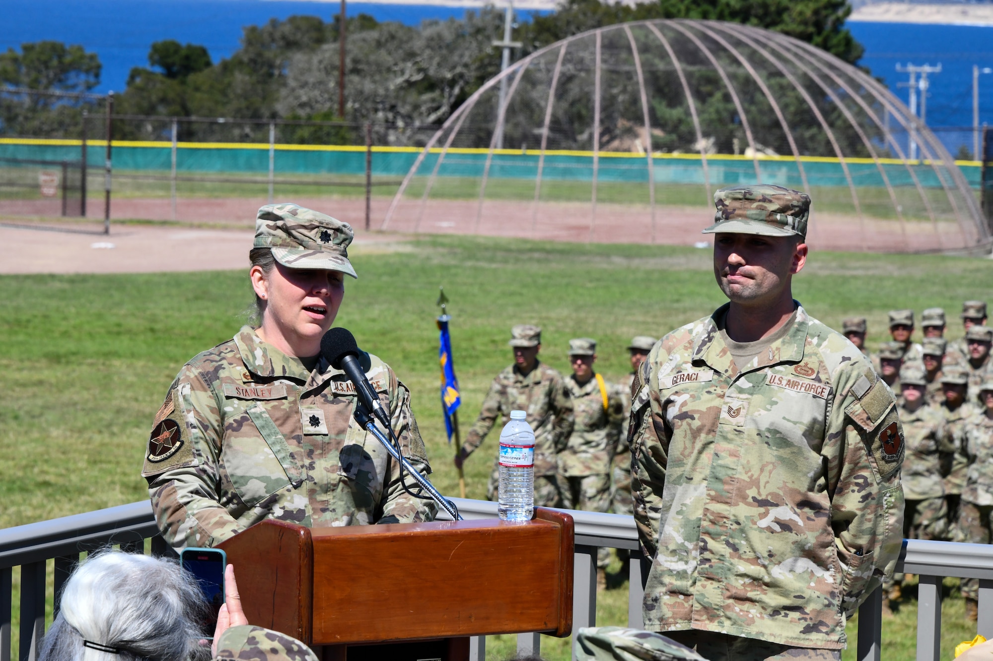 U.S. Air Force Lt. Col. Nicole Stanley, 311th Training Squadron incoming commander, speaks upon assuming command of the 311th TRS on Soldier Field at the Presidio of Monterey, California, July 18, 2025. The change of command ceremony is a military tradition, which illustrates the formal transfer of authority by the passing of the guidon from departing commander to incoming commander. (Courtesy photo)