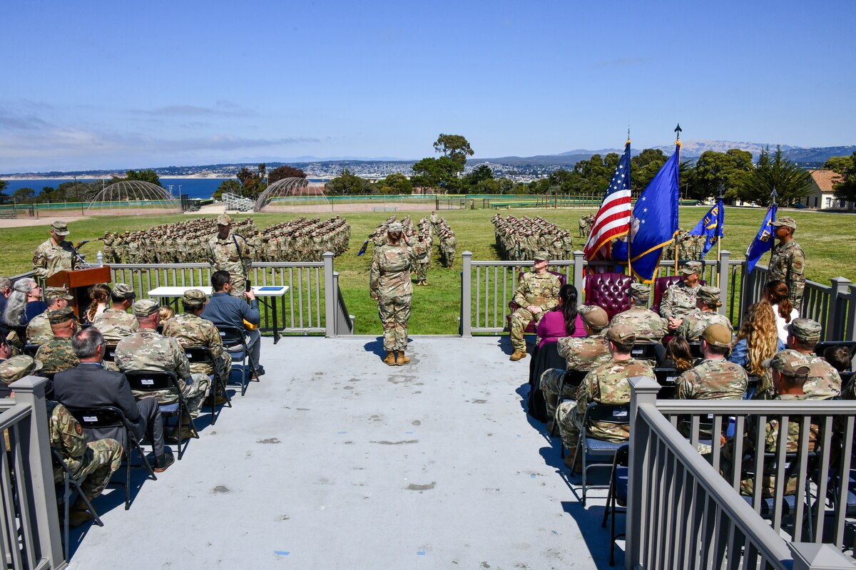 U.S. Air Force Airmen assigned to the 311th Training Squadron present Lt. Col. Nicole Stanley, 311th TRS incoming commander, with her first salute upon taking command on Soldier Field at Presidio of Monterey, California, July 18, 2025. The 311th is integrated with the Defense Language Institute Foreign Language Center operated by the Army and is responsible for training more than 3,600 students in more than 24 different foreign languages with a daily student load of approximately 1,300 Air Force students. (Courtesy photo)