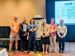 Daniel Lloveras (second from left), a postdoctoral research associate in the Marine Meteorology Division at the U.S. Naval Research Laboratory, poses with fellow award recipients after receiving the Early Career Outstanding Presentation Award at the American Meteorological Society’s 21st Conference on Mesoscale Processes, June 23, 2025, in Boise, Idaho.