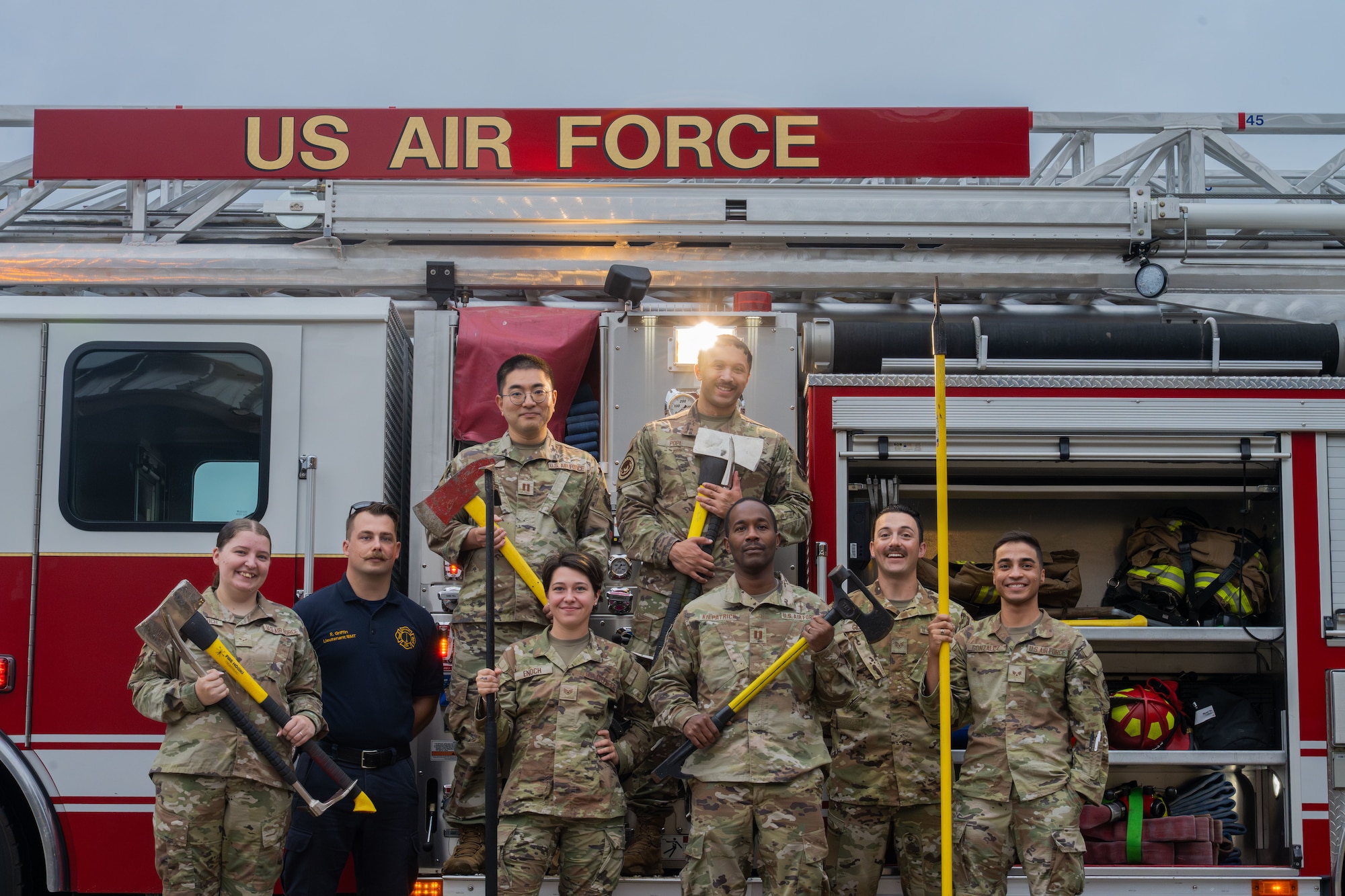 The 22nd Air Refueling Wing chapel team and firefighters 22nd Civil Engineer Squadron pose for a photo during a unit engagement event at McConnell Air Force Base, Kansas, July 18, 2025. The visit was part of the chapel team’s ongoing effort to connect with Airmen while also gaining mission insight. (U.S. Air Force photo by Airman 1st Class Paula Arce)