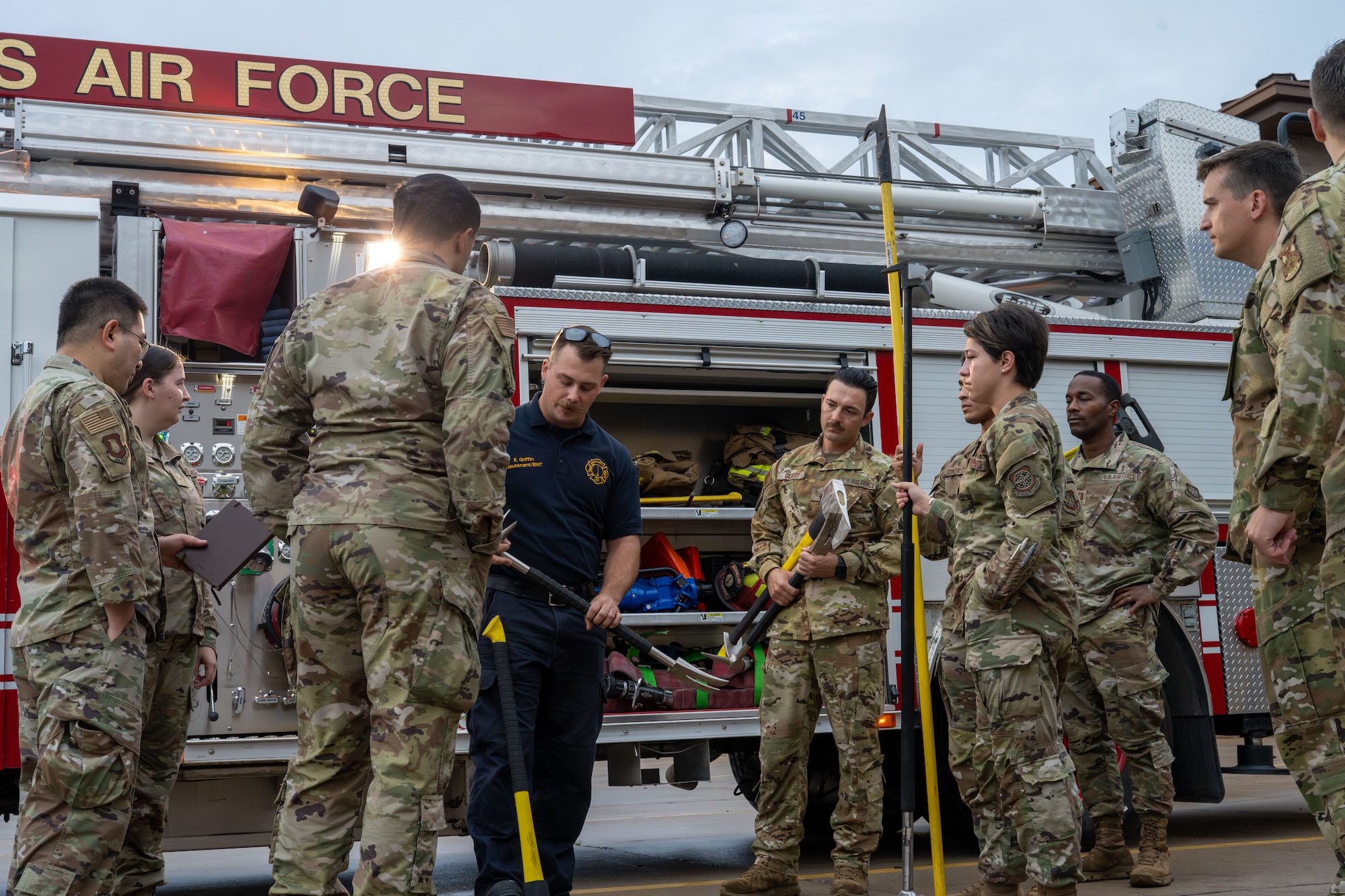 The 22nd Air Refueling Wing chapel team visits the 22nd Civil Engineer Squadron Fire Department during a unit engagement event at McConnell Air Force Base, Kansas, July 18, 2025. The visit was part of the chapel team’s ongoing effort to connect with Airmen while also gaining mission insight. (U.S. Air Force photo by Airman 1st Class Paula Arce)