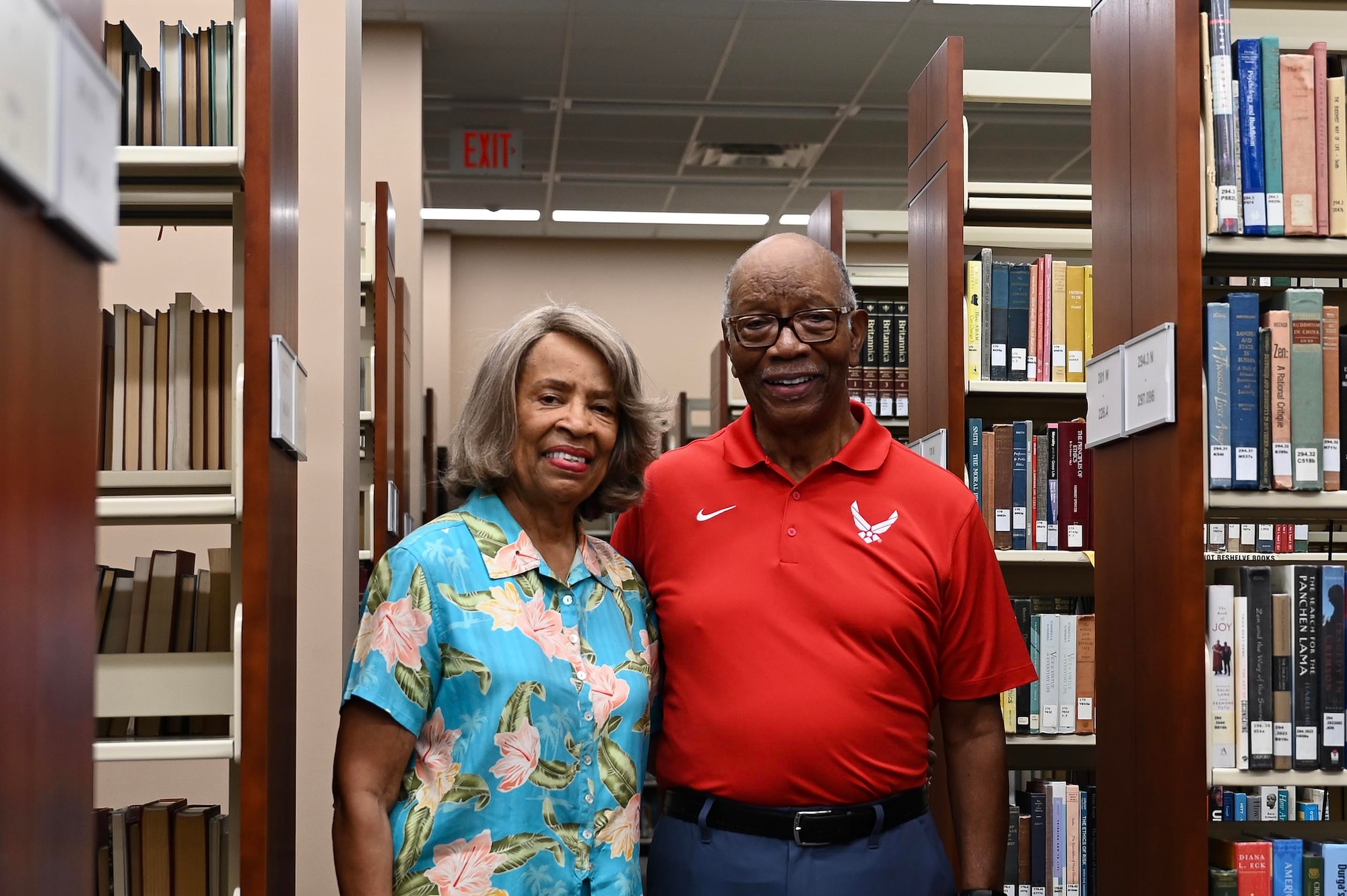 Retired veteran poses with his wife at Maxwell.