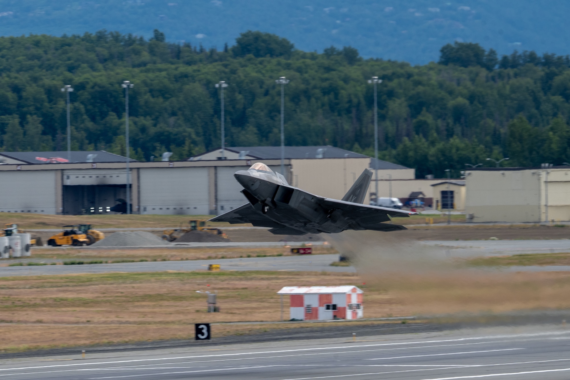 A U.S. Air Force F-22 Raptor assigned to the 90th Fighter Generation Squadron takes flight to support exercise Resolute Force Pacific 2025 at Joint Base Elmendorf-Richardson, Alaska, July 13, 2025.