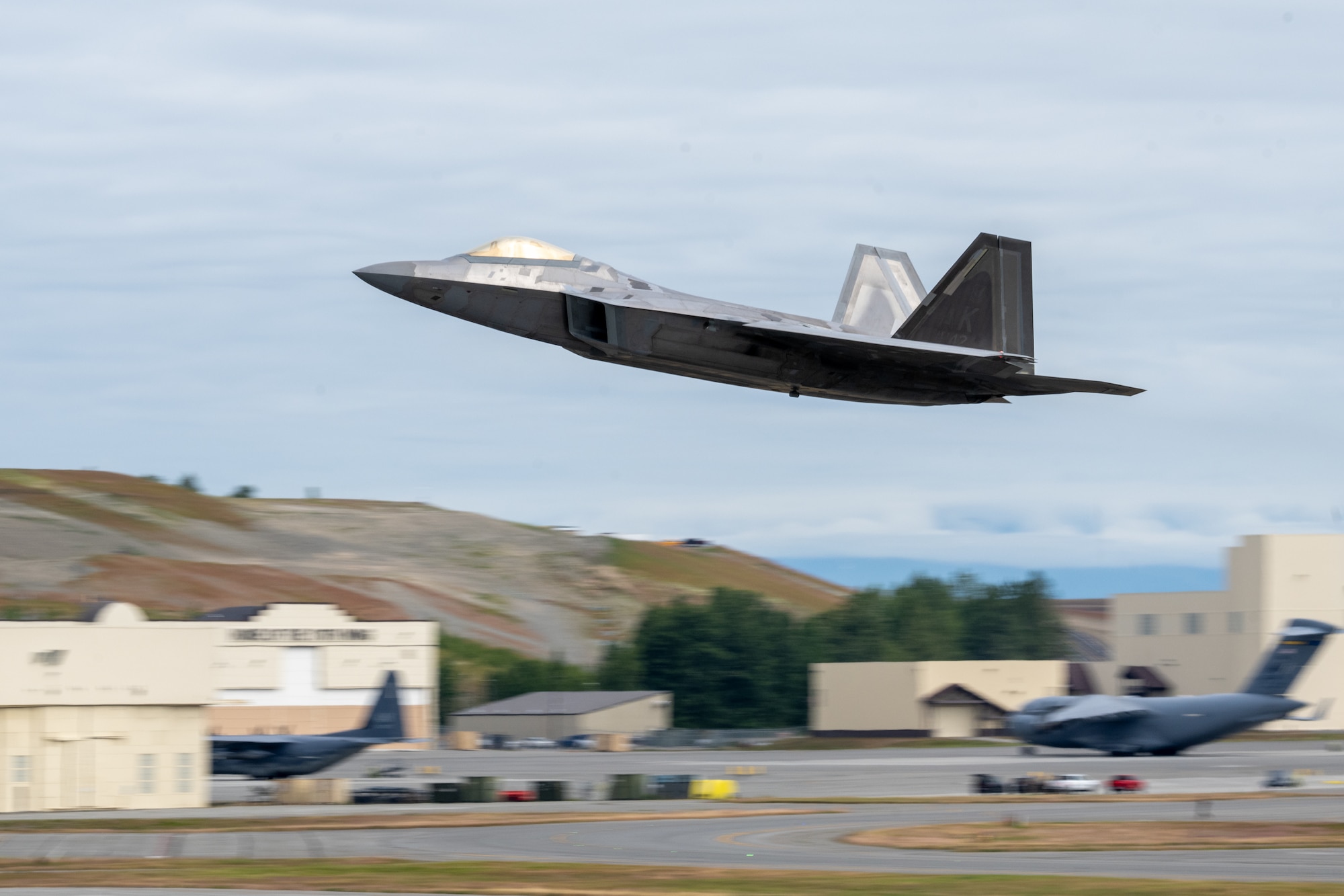 A U.S. Air Force F-22 Raptor assigned to the 90th Fighter Generation Squadron takes flight to support exercise Resolute Force Pacific 2025 at Joint Base Elmendorf-Richardson, Alaska, July 13, 2025.