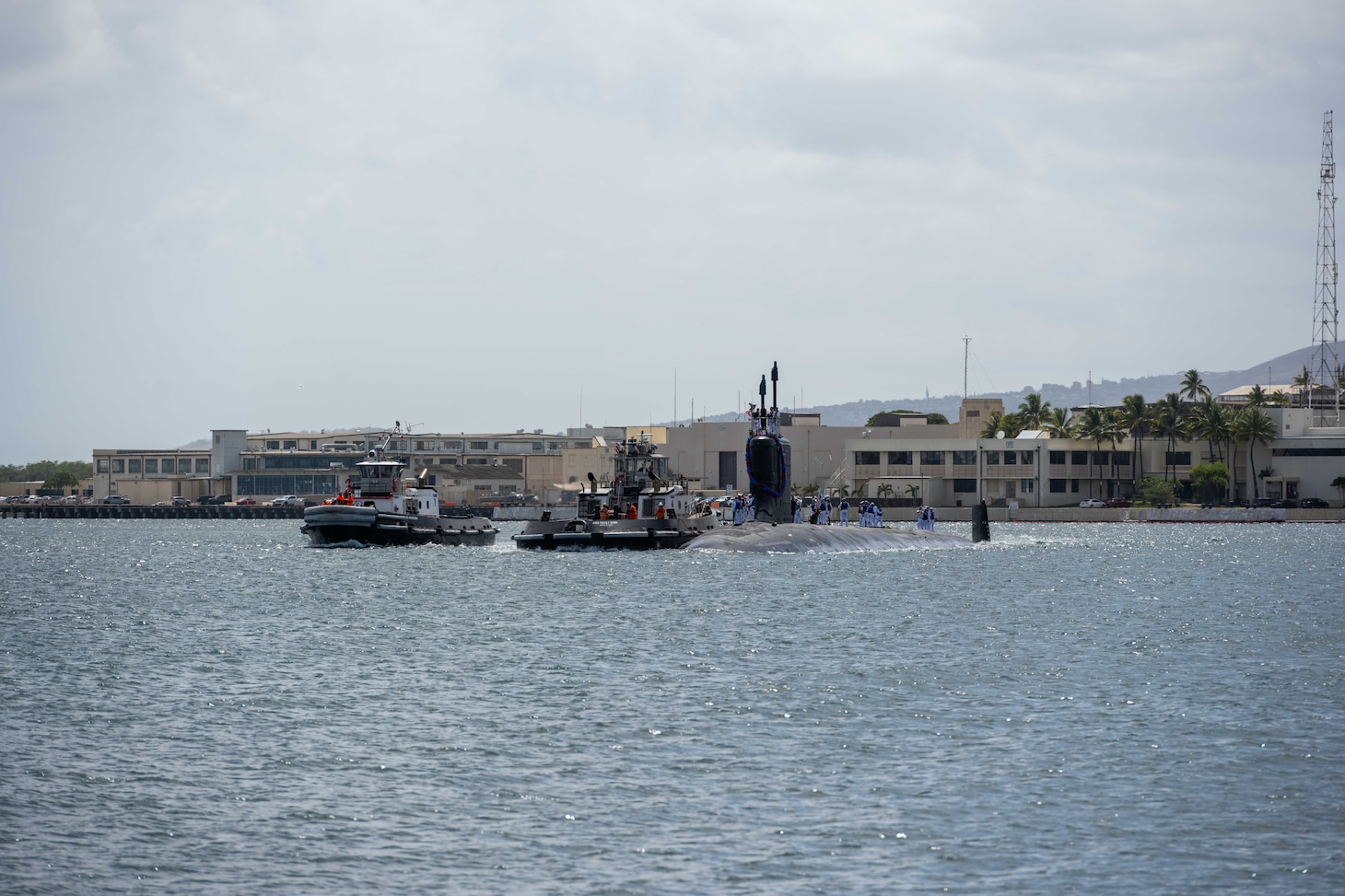 JOINT BASE PEARL HARBOR-HICKAM, Hawaii (July 22, 2025) - Virginia-class fast-attack submarine USS Indiana (SSN 789) arrives at Joint Base Pearl Harbor-Hickam during its change of homeport, July 22, 2025. Indiana is assigned to Submarine Squadron 7 and is capable of supporting various missions, including anti-submarine warfare, anti-surface ship warfare, strike warfare, and intelligence, surveillance, and reconnaissance. (U.S. Navy photo by Mass Communication Specialist 1st Class Scott Barnes)