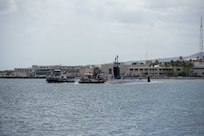JOINT BASE PEARL HARBOR-HICKAM, Hawaii (July 22, 2025) - Virginia-class fast-attack submarine USS Indiana (SSN 789) arrives at Joint Base Pearl Harbor-Hickam during its change of homeport, July 22, 2025. Indiana is assigned to Submarine Squadron 7 and is capable of supporting various missions, including anti-submarine warfare, anti-surface ship warfare, strike warfare, and intelligence, surveillance, and reconnaissance. (U.S. Navy photo by Mass Communication Specialist 1st Class Scott Barnes)