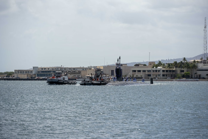 JOINT BASE PEARL HARBOR-HICKAM, Hawaii (July 22, 2025) - Virginia-class fast-attack submarine USS Indiana (SSN 789) arrives at Joint Base Pearl Harbor-Hickam during its change of homeport, July 22, 2025. Indiana is assigned to Submarine Squadron 7 and is capable of supporting various missions, including anti-submarine warfare, anti-surface ship warfare, strike warfare, and intelligence, surveillance, and reconnaissance. (U.S. Navy photo by Mass Communication Specialist 1st Class Scott Barnes)