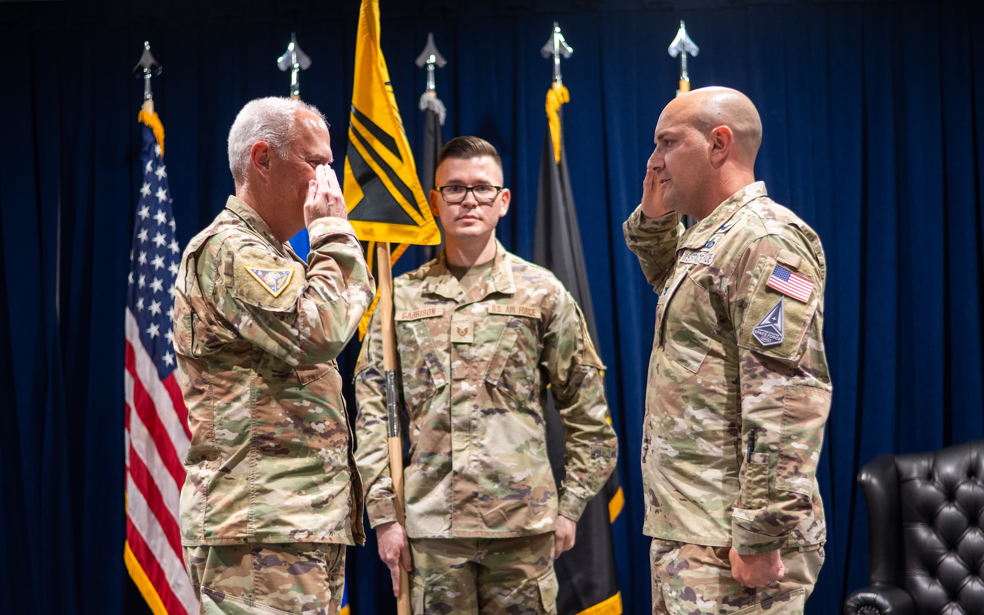 Col. Dane Bannach, commander, SSC System Delta 810, Space-Based Sensing and Targeting, salutes Lt Gen. Phillip A. Garrant, during the Space Sensing System Delta Activation Ceremony at the Space Systems Command’s headquarters at Los Angeles Air Force Base, Jul. 10, 2025. [U.S. Space Force Photo by: Van Ha]