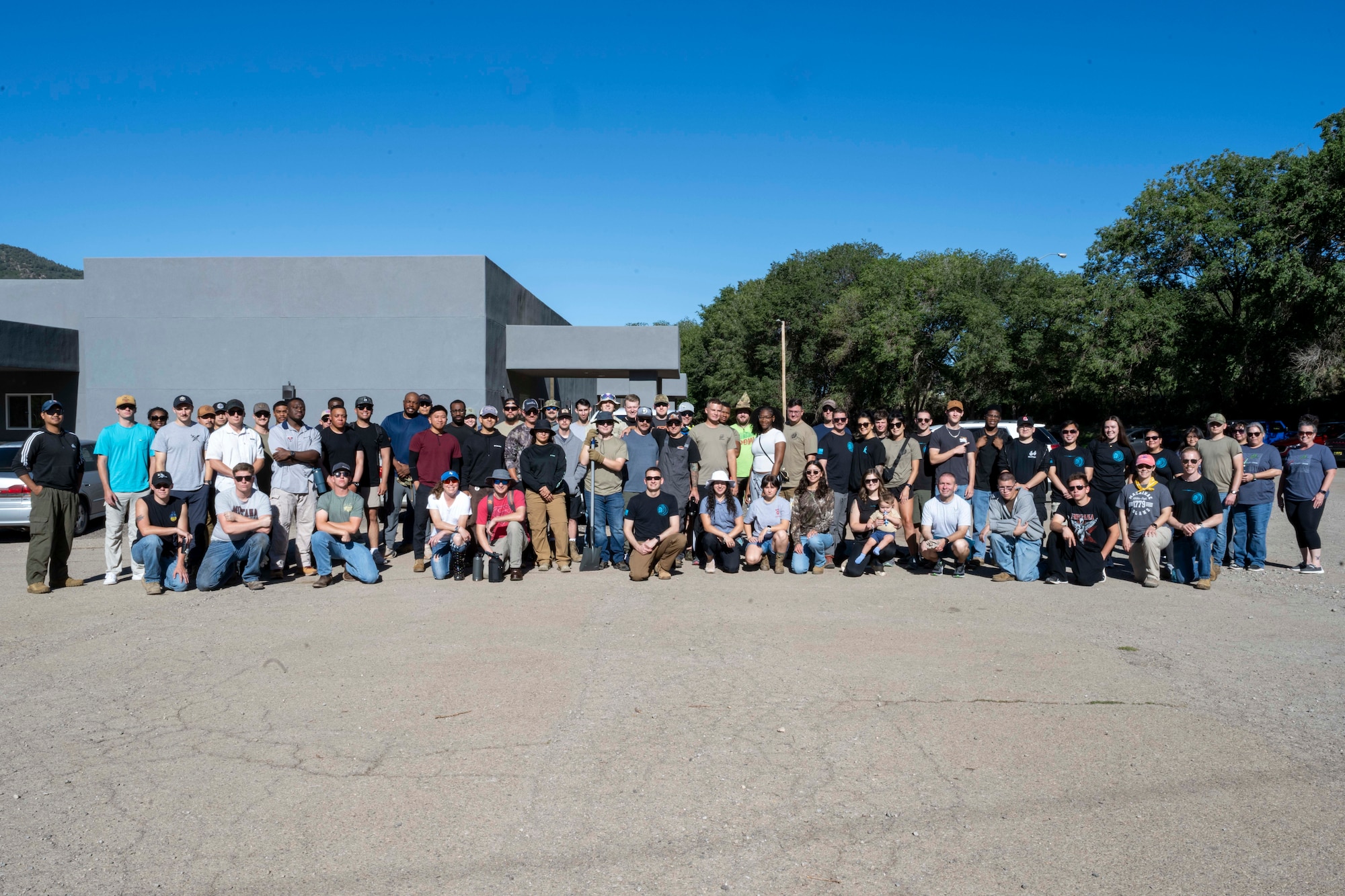 Members of Team Holloman, the 7th Air Support Operations Squadron and community members pose for a photo at Mescalero, New Mexico, July 19, 2025.