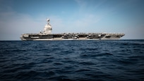 The world's largest aircraft carrier, USS Gerald R. Ford (CVN 78), sails in the Atlantic Ocean, July 4, 2025. Gerald R. Ford, a first-in-class aircraft carrier and deployed flagship of Carrier Strike Group Twelve, incorporates modern technology, innovative shipbuilding designs, and best practices from legacy aircraft carriers to increase the U.S. Navy's capacity to underpin American security and economic prosperity, deter adversaries, and project power on a global scale through sustained operations at sea. (U.S. Navy photo by Mass Communication Specialist 2nd Class Tajh Payne)