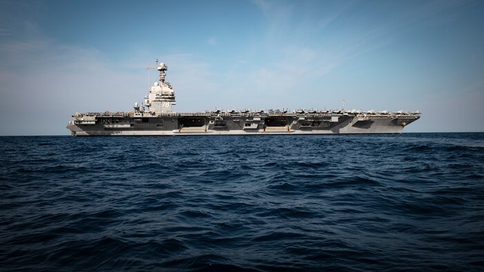 The world's largest aircraft carrier, USS Gerald R. Ford (CVN 78), sails in the Atlantic Ocean, July 4, 2025. Gerald R. Ford, a first-in-class aircraft carrier and deployed flagship of Carrier Strike Group Twelve, incorporates modern technology, innovative shipbuilding designs, and best practices from legacy aircraft carriers to increase the U.S. Navy's capacity to underpin American security and economic prosperity, deter adversaries, and project power on a global scale through sustained operations at sea. (U.S. Navy photo by Mass Communication Specialist 2nd Class Tajh Payne)
