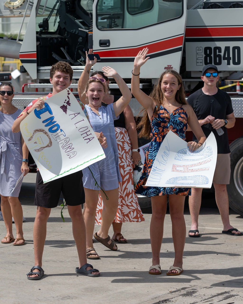JOINT BASE PEARL HARBOR-HICKAM, Hawaii (July 22, 2025) - Friends and family of Sailors assigned to the Virginia-class fast-attack submarine USS Indiana (SSN 789) watch as Indiana arrives at Joint Base Pearl Harbor-Hickam during its change of homeport, July 22, 2025. Indiana is assigned to Submarine Squadron 7 and is capable of supporting various missions, including anti-submarine warfare, anti-surface ship warfare, strike warfare, and intelligence, surveillance, and reconnaissance. (U.S. Navy photo by Mass Communication Specialist 1st Class Scott Barnes)