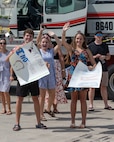 JOINT BASE PEARL HARBOR-HICKAM, Hawaii (July 22, 2025) - Friends and family of Sailors assigned to the Virginia-class fast-attack submarine USS Indiana (SSN 789) watch as Indiana arrives at Joint Base Pearl Harbor-Hickam during its change of homeport, July 22, 2025. Indiana is assigned to Submarine Squadron 7 and is capable of supporting various missions, including anti-submarine warfare, anti-surface ship warfare, strike warfare, and intelligence, surveillance, and reconnaissance. (U.S. Navy photo by Mass Communication Specialist 1st Class Scott Barnes)