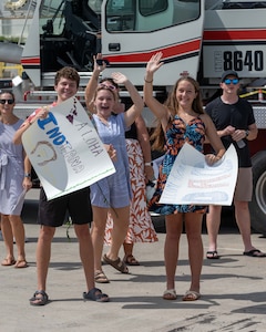 JOINT BASE PEARL HARBOR-HICKAM, Hawaii (July 22, 2025) - Friends and family of Sailors assigned to the Virginia-class fast-attack submarine USS Indiana (SSN 789) watch as Indiana arrives at Joint Base Pearl Harbor-Hickam during its change of homeport, July 22, 2025. Indiana is assigned to Submarine Squadron 7 and is capable of supporting various missions, including anti-submarine warfare, anti-surface ship warfare, strike warfare, and intelligence, surveillance, and reconnaissance. (U.S. Navy photo by Mass Communication Specialist 1st Class Scott Barnes)