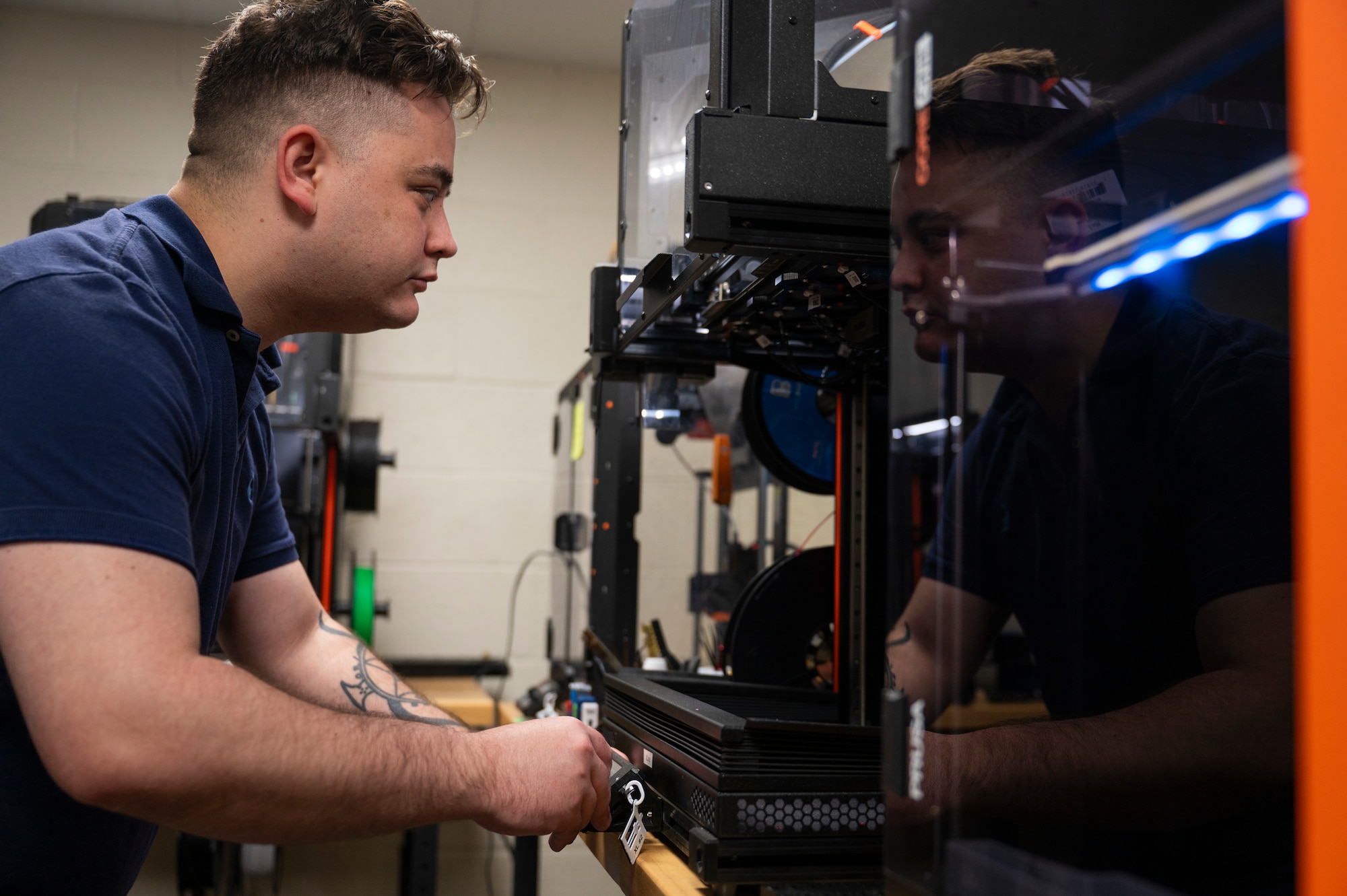 Airman initiating a 3D print