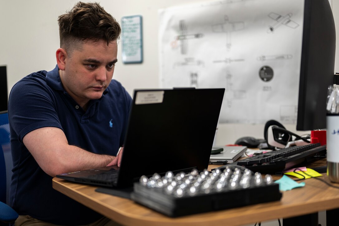 Airman at workdesk