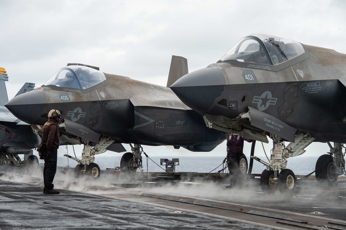 Sailors prepare to conduct flight operations on the flight deck of the Nimitz-class aircraft carrier USS Carl Vinson (CVN 70), July 21, 2025.