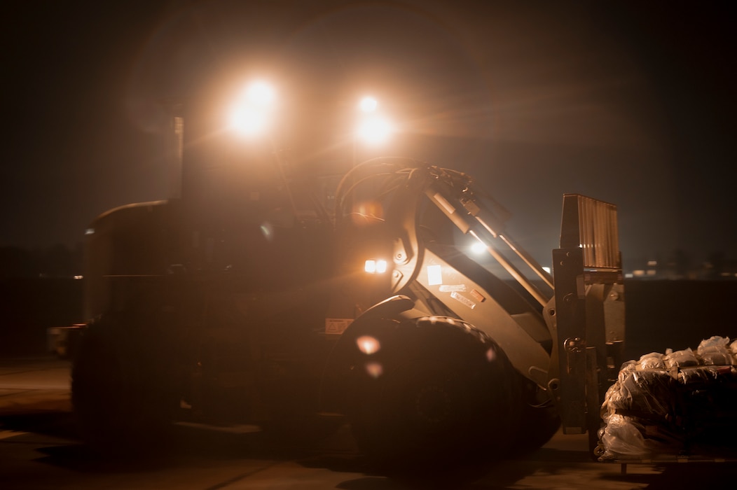 Airman operates forklift