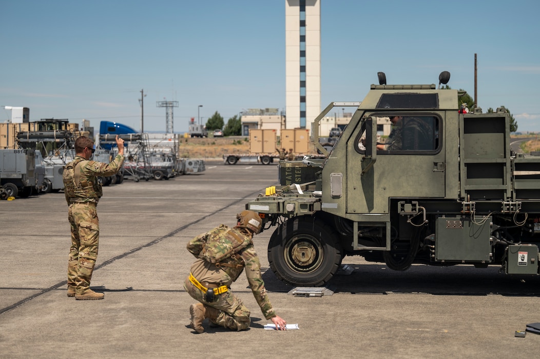 Airmen work together