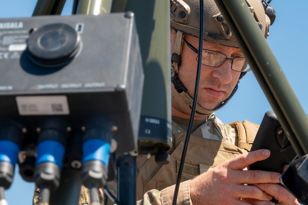 Airman sets up portable weather station