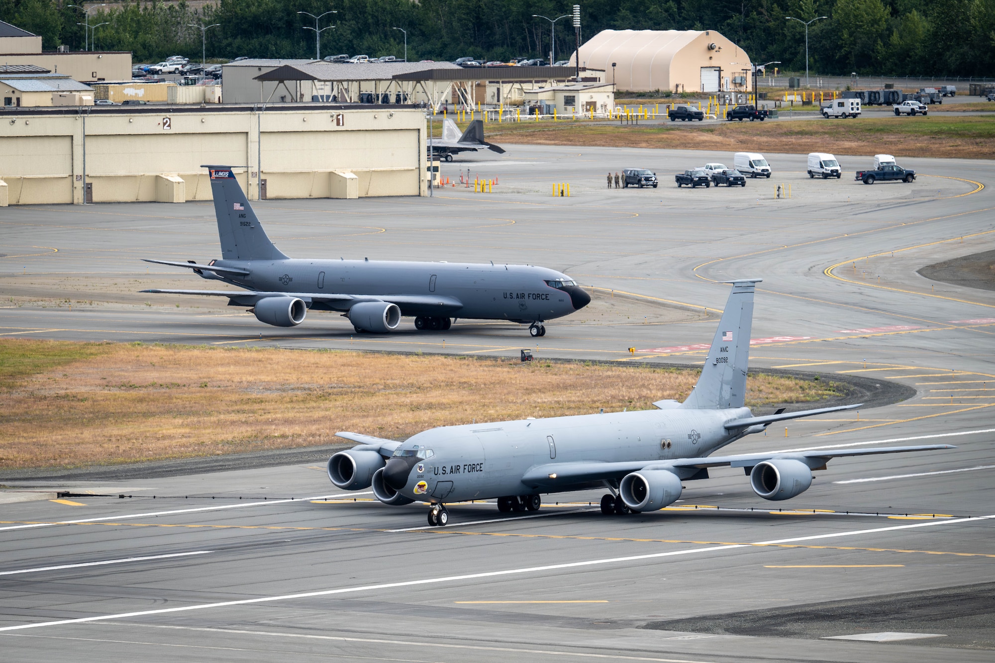 U.S. Air Force KC-135 Stratotanker aircraft assigned to the Illinois Air National Guard, top, and the 92nd Air Refueling Wing, prepare to take off in support of exercise Resolute Force Pacific at Joint Base Elmendorf-Richardson, Alaska, July 13, 2025.