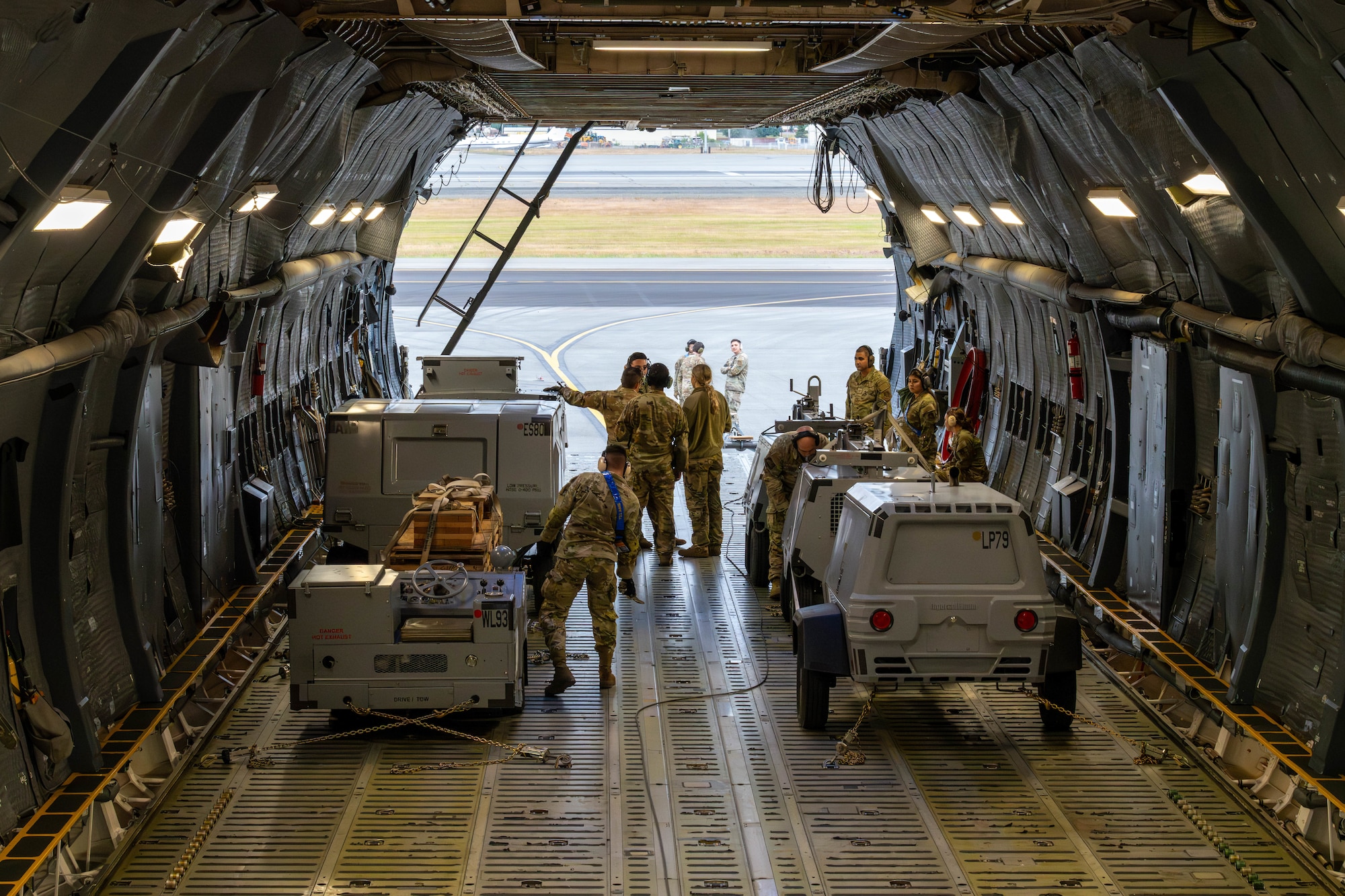 A U.S. Air Force C-5M Super Galaxy assigned to Travis Air Force Base, California, is loaded with equipment for exercise Resolute Force Pacific on Joint Base Elmendorf-Richardson, Alaska, July 13, 2025.