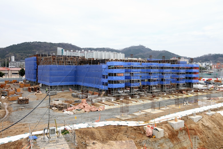 Construction is underway on the new, uniquely designed two-story Vehicle Maintenance Facility (VMF) at Camp Carroll, South Korea. Managed by the U.S. Army Corps of Engineers, Far East District, the $44 million facility includes multiple work bays, integrated workshops, wash bays, and eight bridge cranes. This innovative vertical design maximizes limited space while enhancing maintenance capabilities and logistics support for U.S. Army operations across the Pacific region. (U.S. Army photo by Yo Kyong-il)