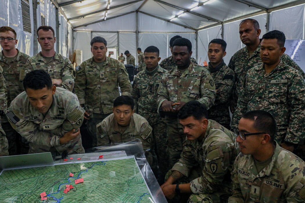 U.S. and Malaysian Army personnel conduct a Mission Analysis (MA) and War Game exercise where Soldiers simulate different courses of action (COAs) July 22, 2025.