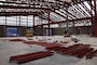 Construction is underway on the new, uniquely designed two-story Vehicle Maintenance Facility (VMF) at Camp Carroll, South Korea. Managed by the U.S. Army Corps of Engineers, Far East District, the $44 million facility includes multiple work bays, integrated workshops, wash bays, and eight bridge cranes. This innovative vertical design maximizes limited space while enhancing maintenance capabilities and logistics support for U.S. Army operations across the Pacific region. (U.S. Army photo by Rachel Napolitan)