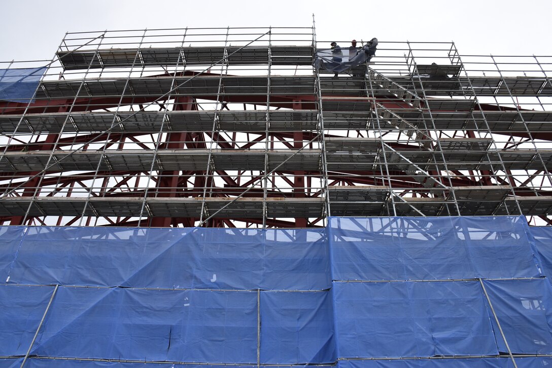 Construction is underway on the new, uniquely designed two-story Vehicle Maintenance Facility (VMF) at Camp Carroll, South Korea. Managed by the U.S. Army Corps of Engineers, Far East District, the $44 million facility includes multiple work bays, integrated workshops, wash bays, and eight bridge cranes. This innovative vertical design maximizes limited space while enhancing maintenance capabilities and logistics support for U.S. Army operations across the Pacific region. (U.S. Army photo by Rachel Napolitan)