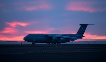 C-5M Super Galaxy aircraft at sunset